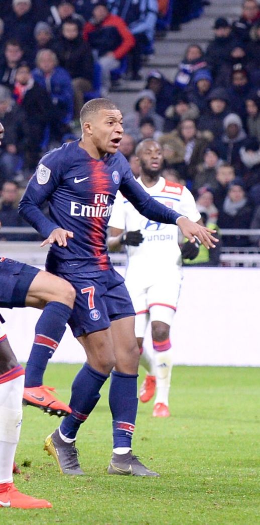 Kylian Mbappe in action for PSG against Lyon in February 2019