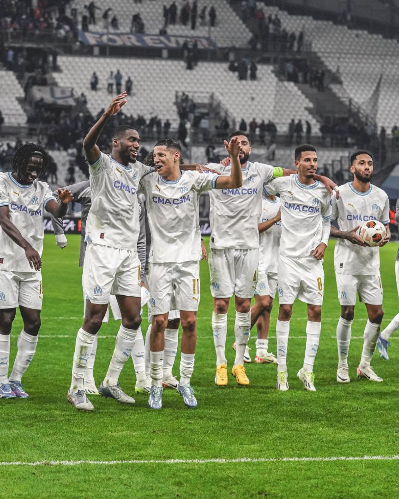 Olympique de Marseille celebrate their win over Ajax at the Vélodrome 
