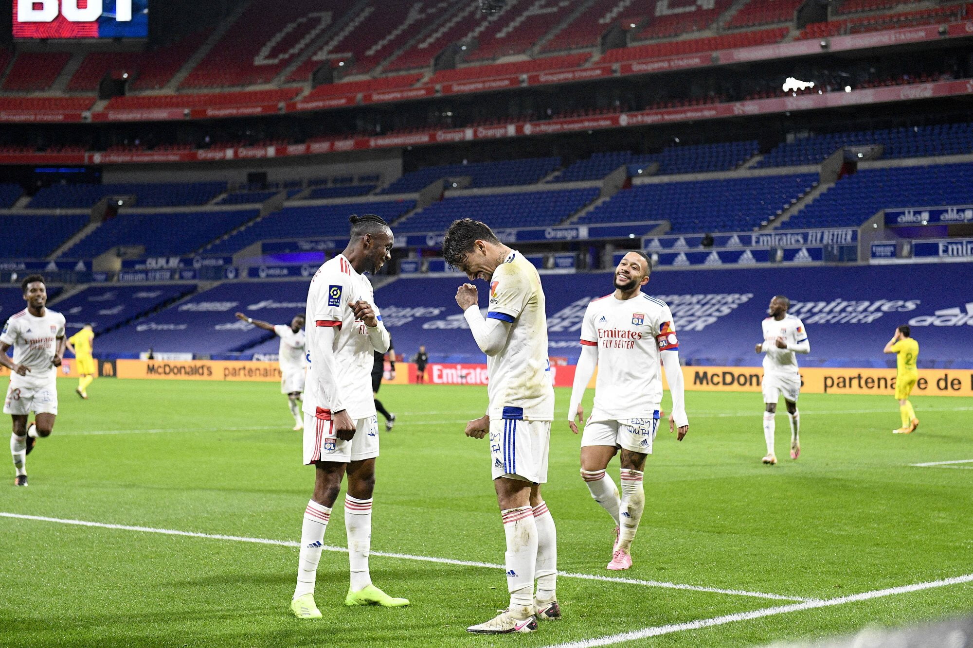 Lucas Paquetá and Tino Kadewere celebrate against FC Nantes