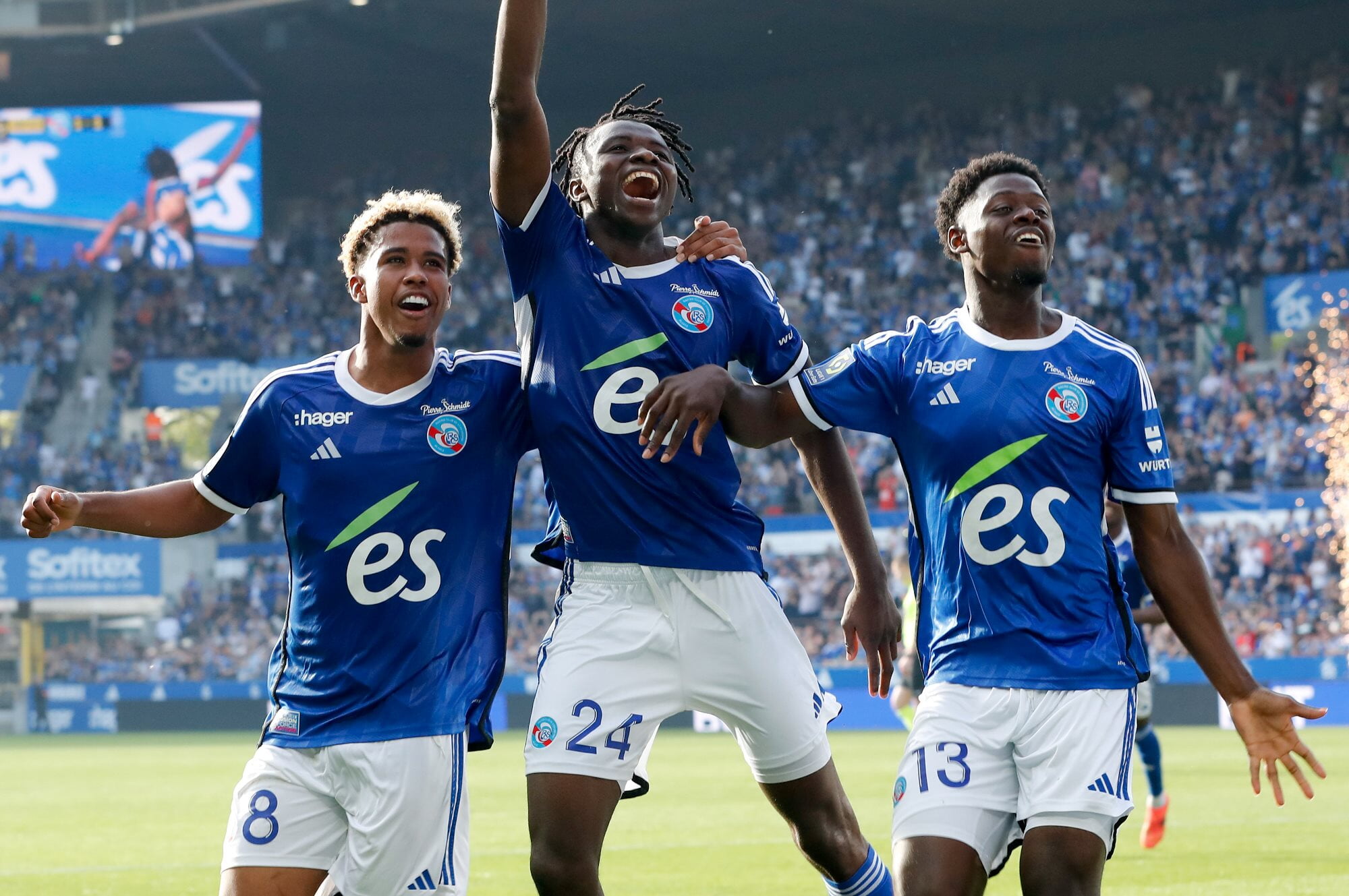 Strasbourg players celebrate a goal 